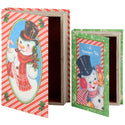 A vintage-style snowman-themed wooden box with a hinged lid, shown open and closed. The lid features a red and white diagonal stripe border with an oval illustration of a snowman wearing a black top hat and red scarf.