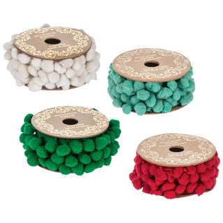 Four spools of decorative pom-pom ribbon in white, mint green, bright green, and red, arranged on a plain white background.